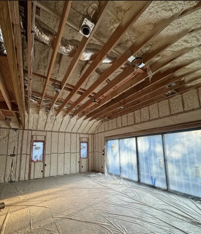 Interior walls and ceiling insulated with spray foam during new construction in Pine Bluff